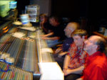 Joe Harnell and Mark Snow look on from the control room at Paramount Studios Scoring Stage M