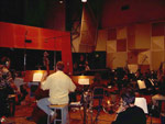 Sam conducts a rehearsal of "Alaska" to make sure the cue's recording will turn out just right