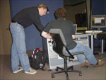 Sam and music editor Sean Dougall take a moment to prepare before the start of a recording session