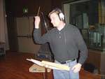 Sam conducts a small ensemble during a recording session at USC's Spielberg Scoring Stage