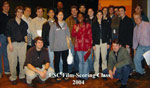 Orchestrator and conductor Pete Anthony poses with Sam and his classmates at USC